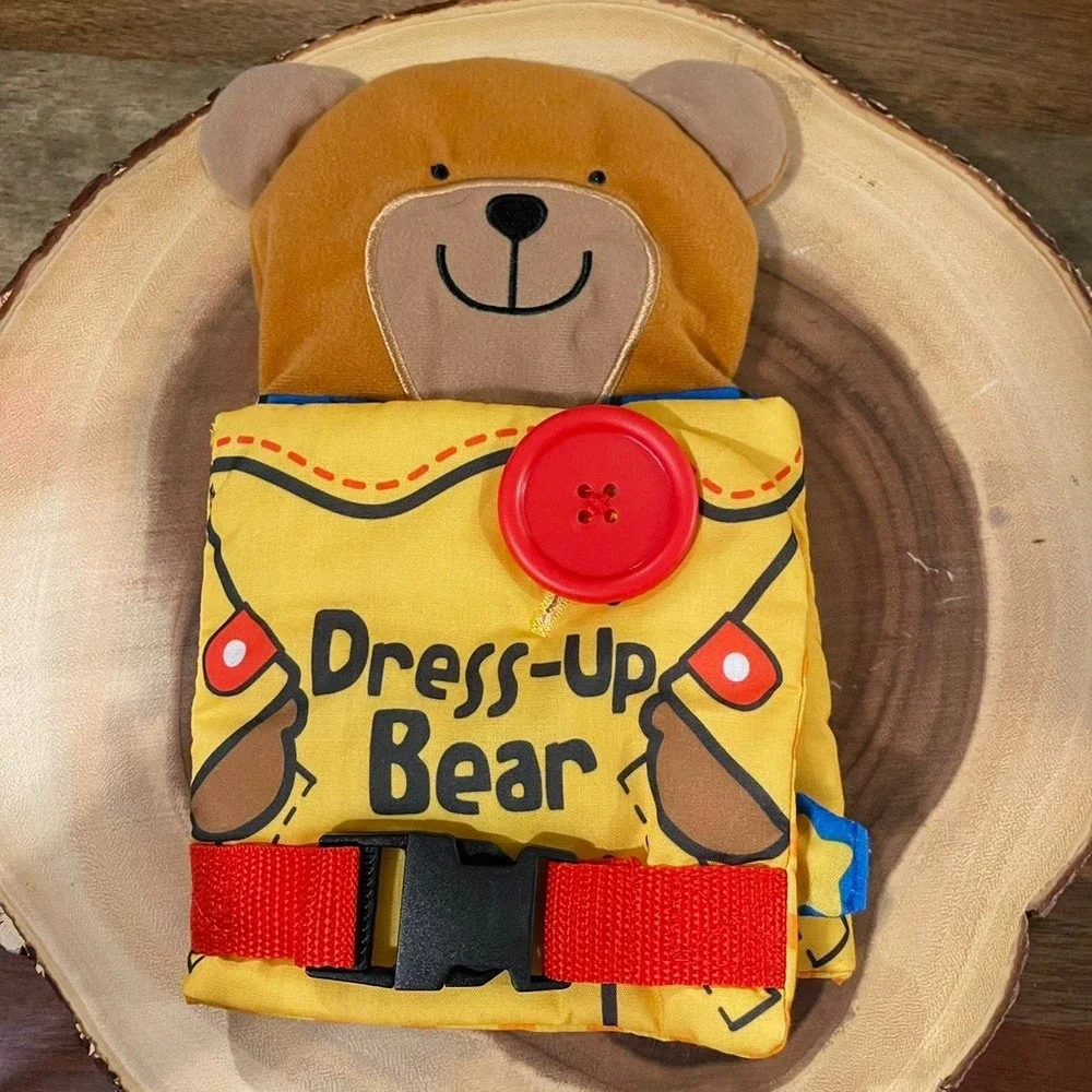 Melissa & Doug Dress-Up Bear Cloth Activity Book Toddler Quiet Book